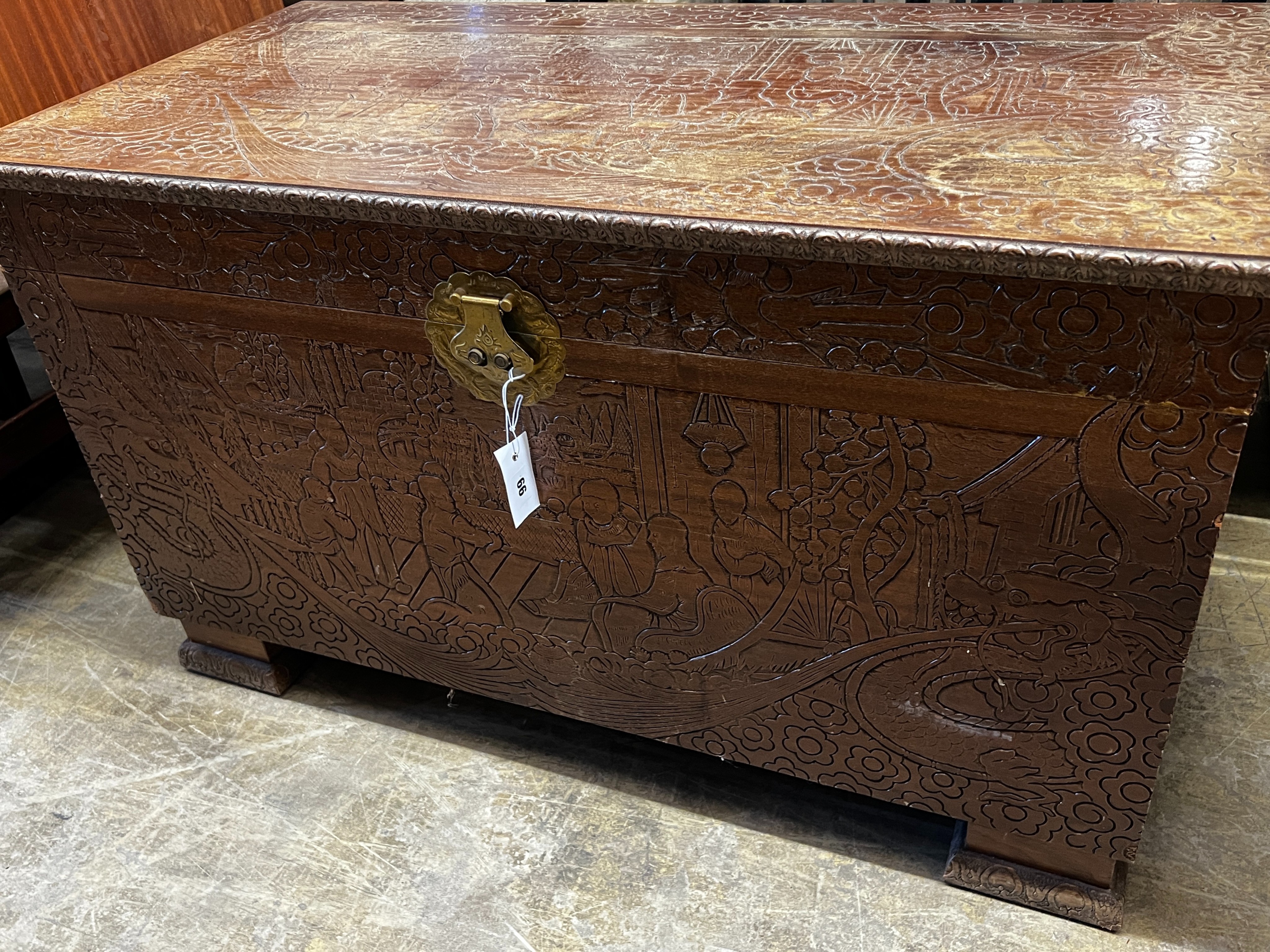 A Chinese carved hardwood trunk, length 102cm, depth 52cm, height 61cm